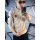 Поло Stone Island бежевого цвета с патчем на рукаве mf038