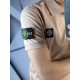 Поло Stone Island бежевого цвета с патчем на рукаве mf038