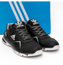 шкіряні кросівки Adidas чорні.