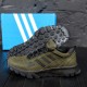 Шкіряні кросівки Adidas Terrex олива