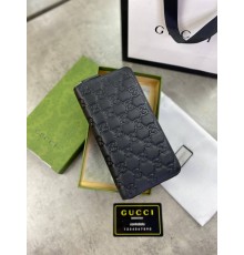 Бумажник Gucci на молнии черный кожаный GG k327