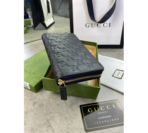 Бумажник Gucci на молнии черный кожаный GG k327